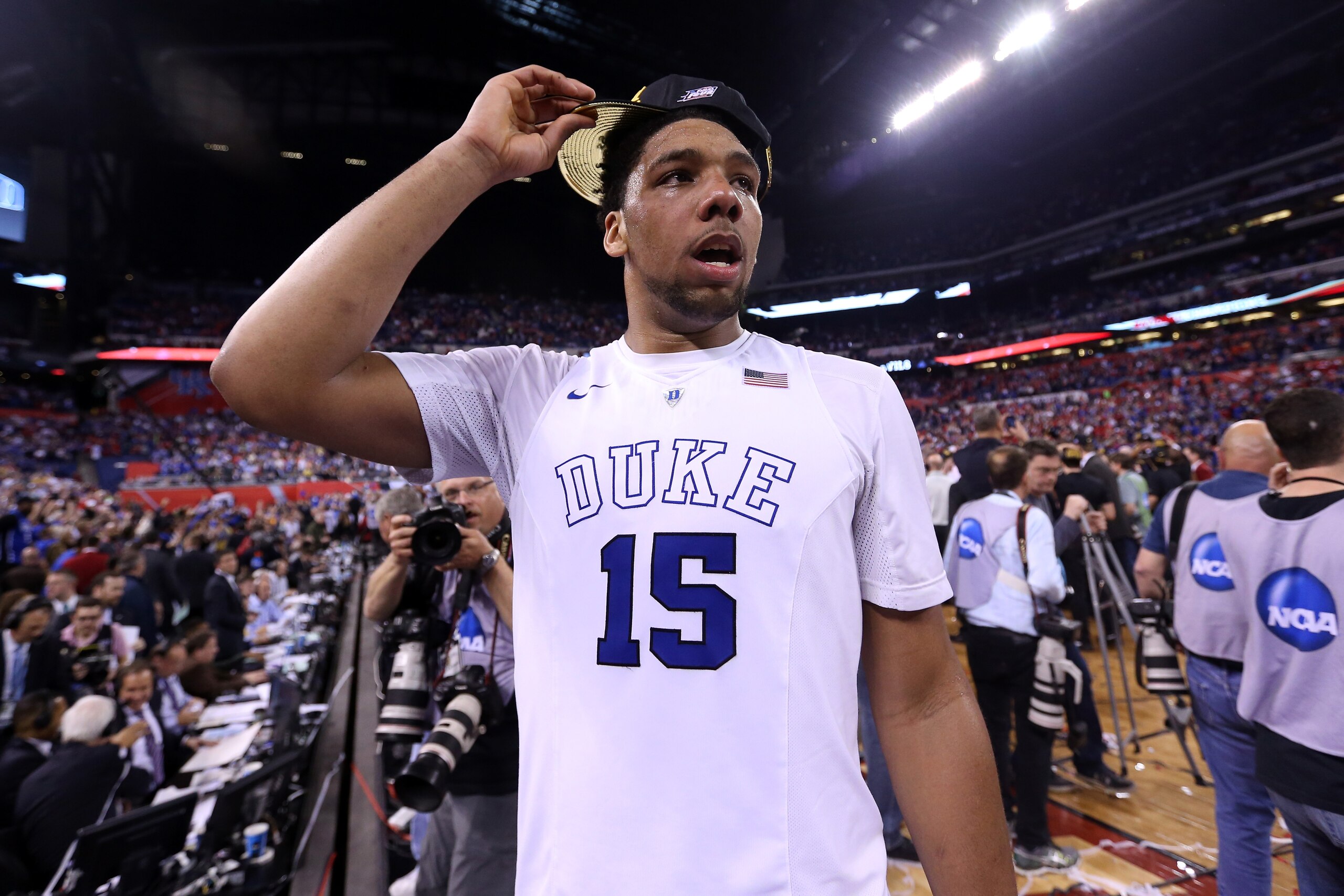 INDIANAPOLIS, IN - APRIL 06: Jahlil Okafor #15 of the Duke Blue Devils celebrates after defeating the Wisconsin Badgers during the NCAA Men's Final Four National Championship at Lucas Oil Stadium on April 6, 2015 in Indianapolis, Indiana. Duke defeated Wisconsin 68-63. (Photo by Streeter Lecka/Getty Images) INDIANAPOLIS, IN - APRIL 06: Jahlil Okafor #15 of the Duke Blue Devils celebrates after defeating the Wisconsin Badgers during the NCAA Men's Final Four National Championship at Lucas Oil Stadium on April 6, 2015 in Indianapolis, Indiana. Duke defeated Wisconsin 68-63. (Photo by Streeter Lecka/Getty Images)
