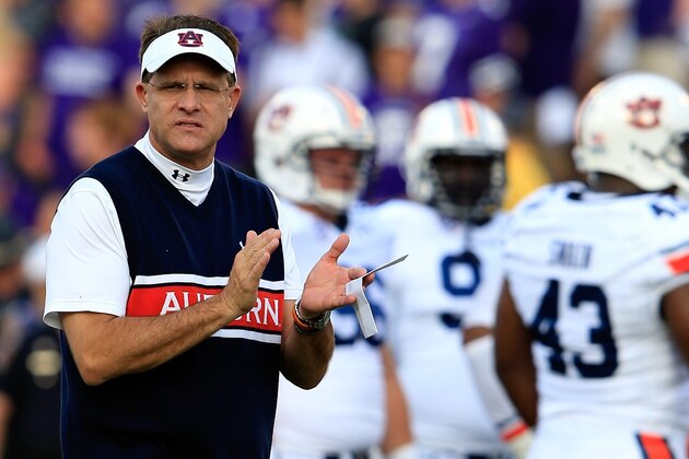 MANHATTAN, KS - SEPTEMBER 18:  Head coach Gus Malzahn of the Auburn Tigers watches pre-game warm-ups prior to the game against the Kansas State Wildcats at Bill Snyder Family Football Stadium on September 18, 2014 in Manhattan, Kansas.  (Photo by Jamie Squire/Getty Images)