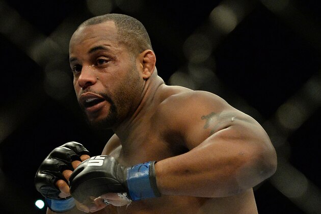 Jan 3, 2015; Las Vegas, NV, USA;  Daniel Cormier (blue gloves) competes in the light heavyweight title fight at UFC 182 at MGM Grand Garden Arena. Mandatory Credit: Jayne Kamin-Oncea-USA TODAY Sports