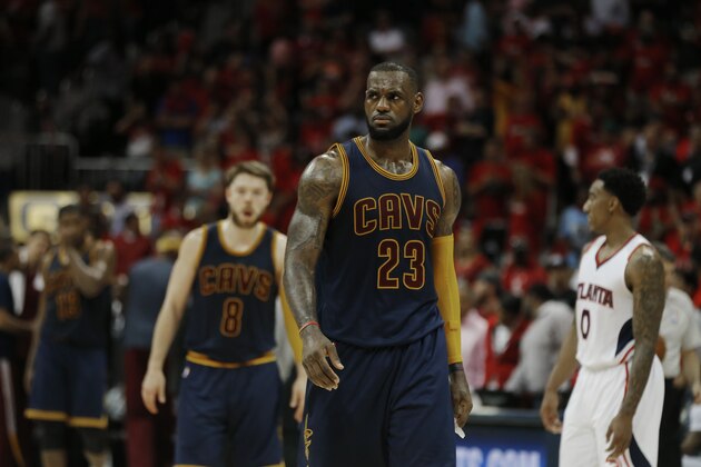 Cleveland Cavaliers forward LeBron James (23) walks down the court during the second half in Game 1 of the Eastern Conference finals of the NBA basketball playoffs against Atlanta Hawks, Wednesday, May 20, 2015, in Atlanta. The Cleveland Cavaliers won 97-89. (AP Photo/John Bazemore)