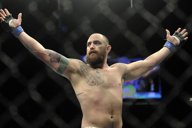 Travis Browne, of Albuquerque, N.M. ,reacts after defeating Josh Barnett, of Fullerton, Calif., during a UFC 168 mixed martial arts heavyweight bout on Saturday, Dec. 28, 2013, in Las Vegas. Browne won by a knockout in the first round. (AP Photo/David Becker)