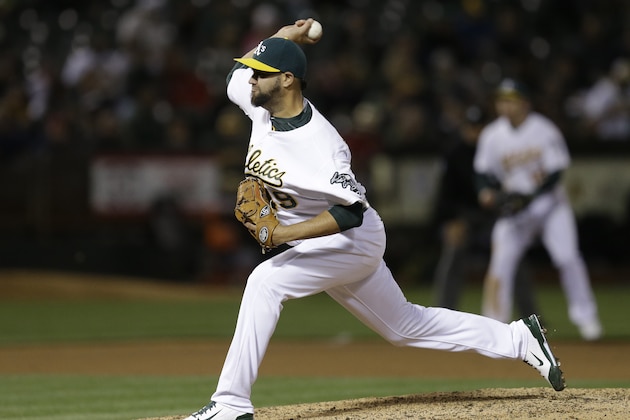 Oakland Athletics' Edward Mujica works against the Boston Red Sox in the eighth inning of a baseball game Monday, May 11, 2015, in Oakland, Calif. (AP Photo/Ben Margot)