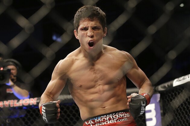 Joseph Benavidez celebrates after beating Darren Uyenoyama during the second round of a UFC flyweight mixed martial arts fight in San Jose, Saturday, April 20, 2013. Benavidez won by technical knock out in the second round. (AP Photo/Jeff Chiu)