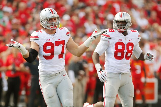 COLLEGE PARK, MD - OCTOBER 04:  Defensive end Joey Bosa #97 of the Ohio State Buckeyes celebrates after one of his first-half sacks against the Maryland Terrapins at Byrd Stadium on October 4, 2014 in College Park, Maryland. Also pictured is teammate Steve Miller #88. (Photo by Jonathan Ernst/Getty Images)