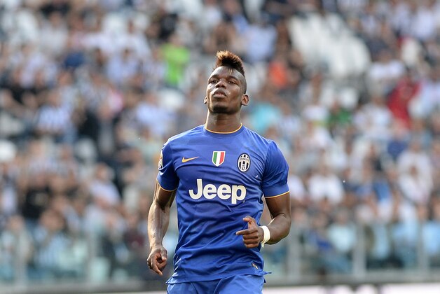 Juventus' Paul Pogba celebrates after scoring during a Serie A soccer match between Juventus and Cagliari at the Juventus stadium, in Turin, Italy, Saturday, May 9, 2015. (AP Photo/Massimo Pinca)