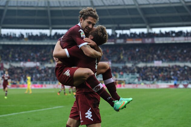 TURIN, ITALY - DECEMBER 22:  Ciro Immobile (R) of Torino FC celebrates his goal with team-mates Alessio Cerci during the Serie A match between Torino FC and AC Chievo Verona at Stadio Olimpico di Torino on December 22, 2013 in Turin, Italy.  (Photo by Valerio Pennicino/Getty Images)