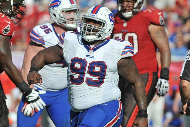 TAMPA, FL -  DECEMBER 8:  Defensive tackle Marcell Dareus #99 of the Buffalo Bills celebrates after a sack against the Tampa Bay Buccaneers December 8, 2013 at Raymond James Stadium in Tampa, Florida. (Photo by Al Messerschmidt/Getty Images)