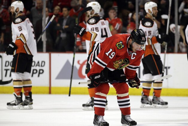 Chicago Blackhawks center Jonathan Toews (19) reacts after Game 3 of the Western Conference finals against the Anaheim Ducks in the NHL hockey Stanley Cup playoffs, Thursday, May 21, 2015, in Chicago. The Ducks won 2-1. (AP Photo/Nam Y. Huh)