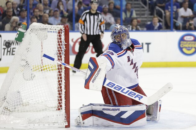 New York Rangers goalie Henrik Lundqvist (30), of Sweden, defends the goal during the second period of Game 3 of the Eastern Conference finals against the Tampa Bay Lightning, during an NHL hockey Stanley Cup playoffs Wednesday, May 20, 2015, in Tampa, Fla. (AP Photo/Chris O'Meara)