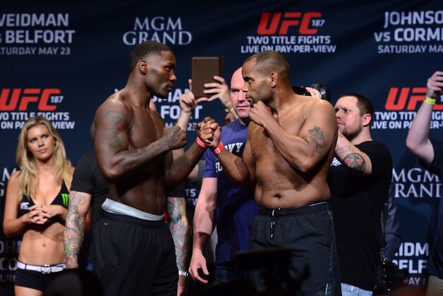 May 22, 2015; Las Vegas, NV, USA; Anthony Johnson (L) and Daniel Cormier (R) face off after weighing in for their light heavyweight bout at MGM GrandBallroom. Mandatory Credit: Joe Camporeale-USA TODAY Sports