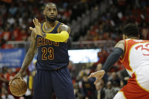 Cleveland Cavaliers forward LeBron James (23) stands on the court against the Atlanta Hawks during the second half in Game 2 of the Eastern Conference finals of the NBA basketball playoffs, Friday, May 22, 2015, in Atlanta. (AP Photo/David Goldman)