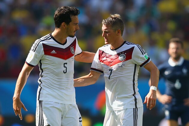 RIO DE JANEIRO, BRAZIL - JULY 04:  Mats Hummels of Germany (L) celebrates scoring his team's first goal with Bastian Schweinsteiger during the 2014 FIFA World Cup Brazil Quarter Final match between France and Germany at Maracana on July 4, 2014 in Rio de Janeiro, Brazil.  (Photo by Martin Rose/Getty Images)