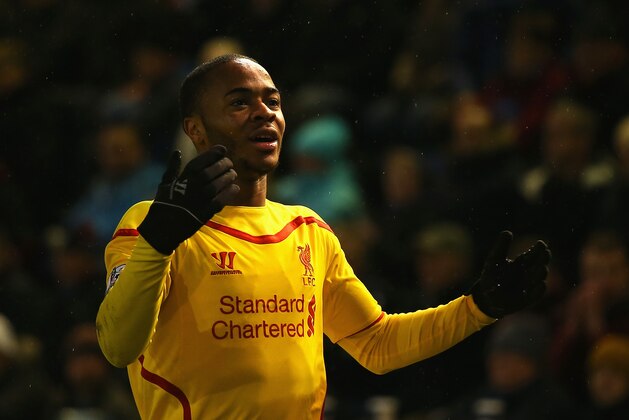 BURNLEY, ENGLAND - DECEMBER 26:  Raheem Sterling of Liverpool celebrates scoring the opening goal during the Barclays Premier League match between Burnley and Liverpool at Turf Moor on December 26, 2014 in Burnley, England.  (Photo by Bryn Lennon/Getty Images)