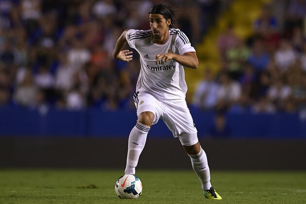 VALENCIA, SPAIN - OCTOBER 05:  Sami Khedira of Real Madrid runs with the ball during the La Liga match between Levante UD and Real Madrid at Ciutat de Valencia on October 5, 2013 in Valencia, Spain.  (Photo by Manuel Queimadelos Alonso/Getty Images)