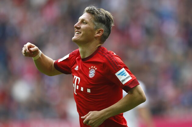 Bayern's Bastian Schweinsteiger celebrates after scoring his side's second goal during the German first division Bundesliga soccer match between FC Bayern Munich and 1. FSV Mainz 05 at the Allianz Arena in Munich, Germany, on Saturday, May 23, 2015. (AP Photo/Matthias Schrader)