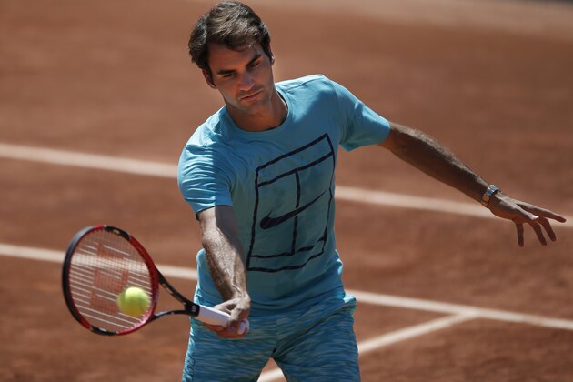 Switzerland's Roger Federer practices during a training session for the French Tennis Open at the Roland Garros stadium, in Paris, Saturday, May 23, 2015. The French Open starts Sunday. (AP Photo/Francois Mori)