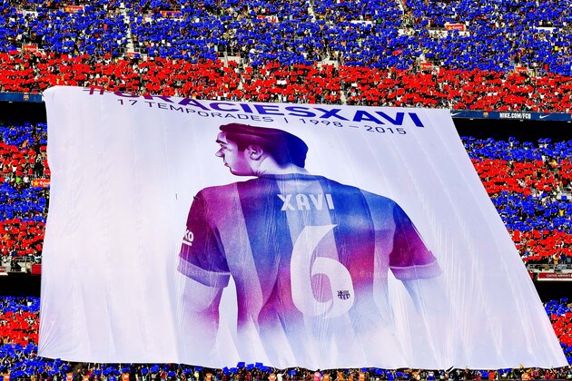 BARCELONA, SPAIN - MAY 23:  FC Barcelona fans display a huge banner tribute to Xavi Hernanez prior to the La Liga match between FC Barcelona and RC Deportivo de la Coruna at Camp Nou on May 23, 2015 in Barcelona, Spain.  (Photo by David Ramos/Getty Images)
