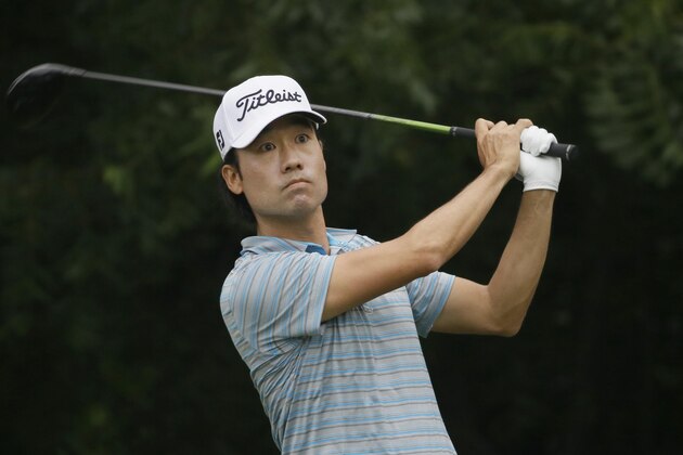 Kevin Na watch his tee shot on the sixth hole during the third round of the Colonial golf tournament Saturday, May 23, 2015, in Fort Worth, Texas. (AP Photo/LM Otero)