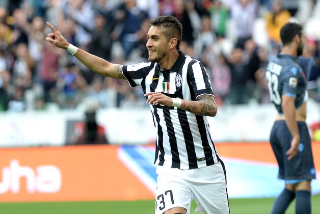 Juventus' Roberto Pereyra celebrates after scoring during a Serie A soccer match between Juventus and Napoli at the Juventus stadium, in Turin, Italy, Saturday, May 23, 2015. (AP Photo/Massimo Pinca)
