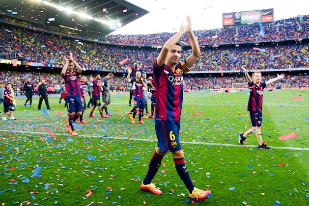 BARCELONA, SPAIN - MAY 23:  Xavi Hernandez of FC Barcelona waves to the spectators after the La Liga match between FC Barcelona and RC Deportivo La Coruna at Camp Nou on May 23, 2015 in Barcelona, Spain.  (Photo by Alex Caparros/Getty Images)