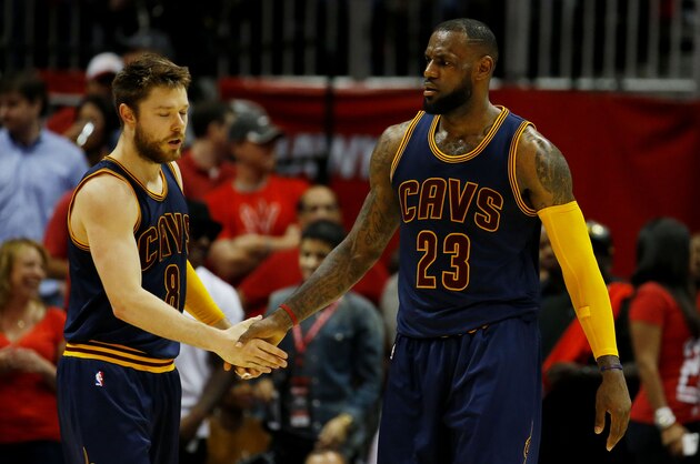 ATLANTA, GA - MAY 22:  LeBron James #23 and Matthew Dellavedova #8 of the Cleveland Cavaliers react in the third quarter against the Atlanta Hawks during Game Two of the Eastern Conference Finals of the 2015 NBA Playoffs at Philips Arena on May 22, 2015 in Atlanta, Georgia. NOTE TO USER: User expressly acknowledges and agrees that, by downloading and or using this Photograph, user is consenting to the terms and conditions of the Getty Images License Agreement.  (Photo by Kevin C. Cox/Getty Images)