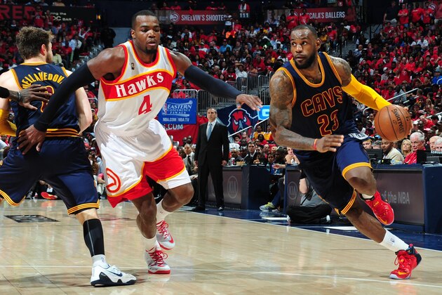 ATLANTA, GA - MAY 22: LeBron James #23 of the Cleveland Cavaliers handles the ball against the Atlanta Hawks in Game Two of the Eastern Conference Finals of the NBA Playoffs on May 22, 2015 at Philips Arena in Atlanta, Georgia.  NOTE TO USER: User expressly acknowledges and agrees that, by downloading and/or using this Photograph, user is consenting to the terms and conditions of the Getty Images License Agreement. Mandatory Copyright Notice: Copyright 2015 NBAE (Photo by Scott Cunningham/NBAE via Getty Images)