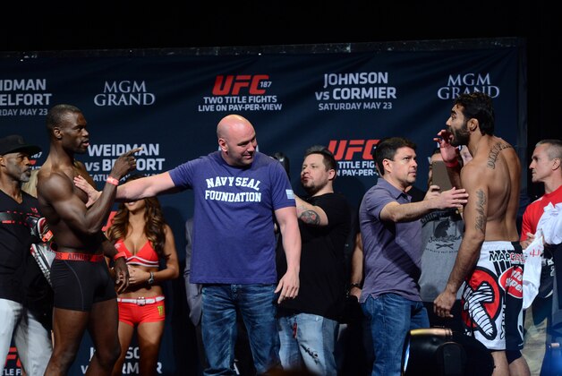 May 22, 2015; Las Vegas, NV, USA; Uriah Hall (L) and  Rafael Natal (R) are separated by UFC president Dana White (C) after weighing in for their middleweight bout at MGM Grand Ballroom. Mandatory Credit: Joe Camporeale-USA TODAY Sports