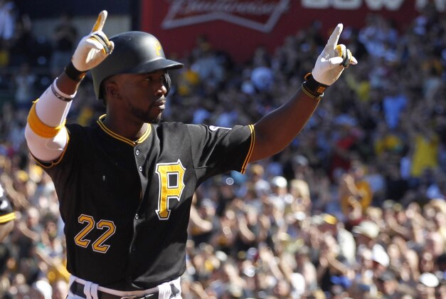 May 23, 2015; Pittsburgh, PA, USA;  Pittsburgh Pirates center fielder Andrew McCutchen (22) reacts after hitting a two run home run against the New York Mets during the first inning at PNC Park. Mandatory Credit: Charles LeClaire-USA TODAY Sports