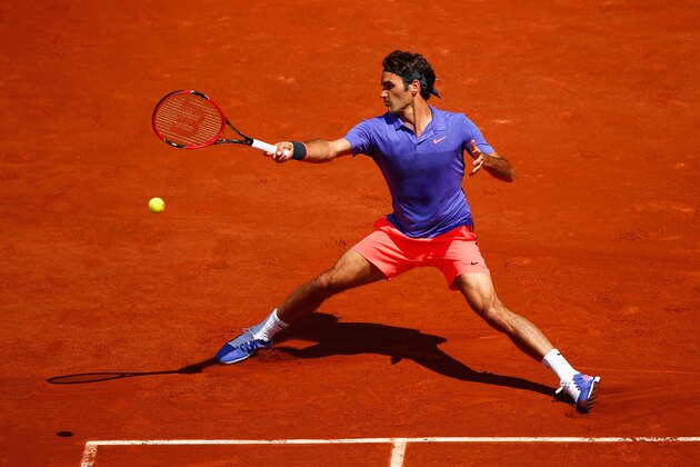 PARIS, FRANCE - MAY 24:  Roger Federer of Switzerland plays a forehand during his Men's Singles match against Alejandro Falla of Colombia on day one of the 2015 French Open at Roland Garros on May 24, 2015 in Paris, France.  (Photo by Julian Finney/Getty Images)