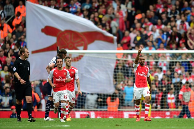 LONDON, ENGLAND - MAY 24: Theo Walcott of Arsenal celebrates his team's fourth goal to make a hat trick during the Barclays Premier League match between Arsenal and West Bromwich Albion at Emirates Stadium on May 24, 2015 in London, England.  (Photo by Jamie McDonald/Getty Images)