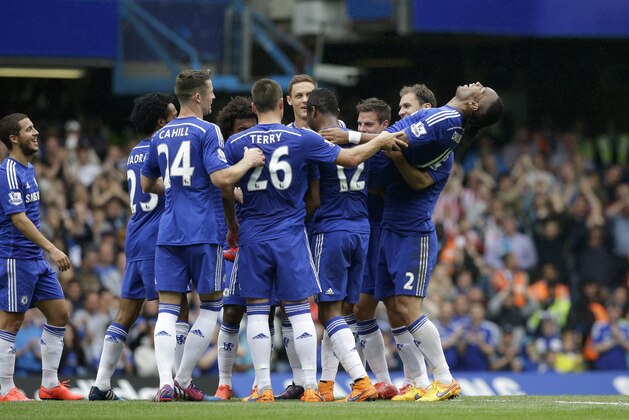 Chelsea's Didier Drogba, top right, is carried off by his teammates as a mark of respect as he is substituted off in what is expected to be his last game for the club during the English Premier League soccer match between Chelsea and Sunderland at Stamford Bridge stadium in London, Sunday, May 24, 2015.  (AP Photo/Matt Dunham)