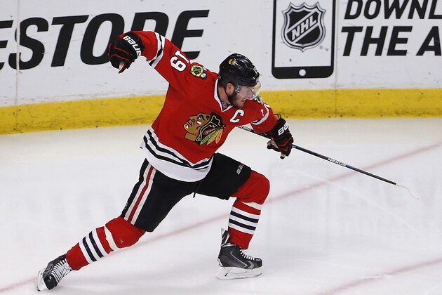 Chicago Blackhawks center Jonathan Toews celebrates his goal against the Anaheim Ducks during the third period in Game 4 of the Western Conference finals of the NHL hockey Stanley Cup playoffs, Saturday, May 23, 2015, in Chicago. (AP Photo/Charles Rex Arbogast)