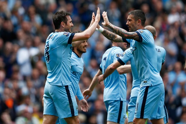 MANCHESTER, ENGLAND - MAY 24: Frank Lampard of Manchester City celebrates scoring his team's first goal with his team mate Aleksandar Kolarov during the Barclays Premier League match between Manchester City and Southampton at Etihad Stadium on May 24, 2015 in Manchester, England.  (Photo by Dean Mouhtaropoulos/Getty Images)