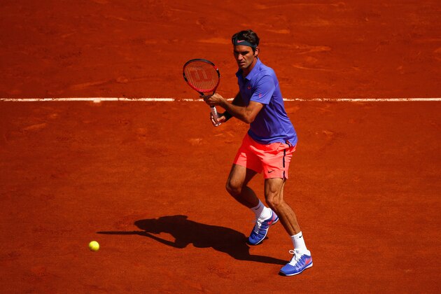 PARIS, FRANCE - MAY 24:  Roger Federer of Switzerland plays a forehand during his Men's Singles match against Alejandro Falla of Colombia on day one of the 2015 French Open at Roland Garros on May 24, 2015 in Paris, France.  (Photo by Julian Finney/Getty Images)