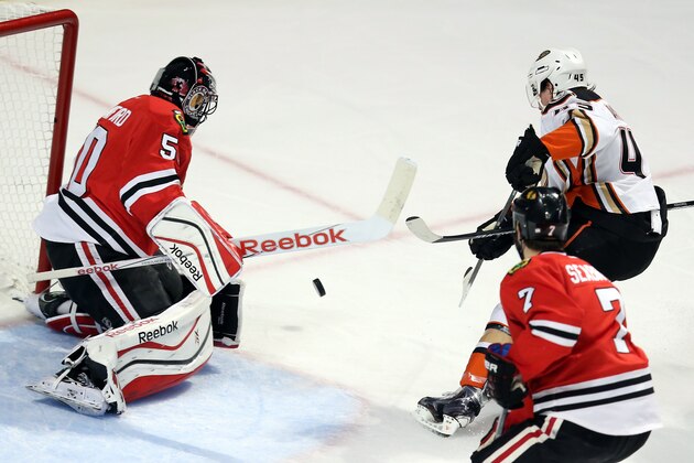 CHICAGO, IL - MAY 23: Sami Vatanen #45 of the Anaheim Ducks takes a shot against Corey Crawford #50 of the Chicago Blackhawks in the second period of Game Four of the Western Conference Finals during the 2015 NHL Stanley Cup Playoffs at the United Center on May 23, 2015 in Chicago, Illinois.  (Photo by Tasos Katopodis/Getty Images)