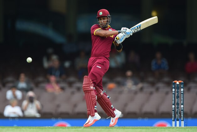 SYDNEY, AUSTRALIA - FEBRUARY 09:  Lendl Simmons of West Indies plays a shot during the ICC Cricket World Cup warm up match between England and the West Indies at Sydney Cricket Ground on February 9, 2015 in Sydney, Australia.  (Photo by Shaun Botterill/Getty Images)