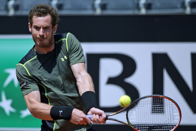 Andy Murray, of Britain, returns the ball to Jeremy Chardy, of France, during their match at the Italian Open tennis tournament, in Rome, Wednesday, May 13, 2015. (AP Photo/Andrew Medichini)