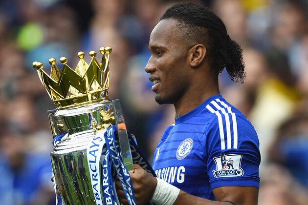 LONDON, ENGLAND - MAY 24:  Didier Drogba of Chelsea holds the trophy after the Barclays Premier League match between Chelsea and Sunderland at Stamford Bridge on May 24, 2015 in London, England.  (Photo by Laurence Griffiths/Getty Images)