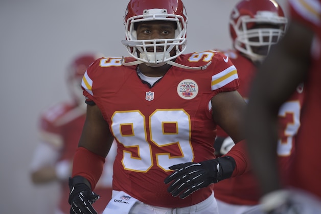 Kansas City Chiefs defensive tackle Vance Walker (99) comes onto the field during an NFL preseason football game between the Kansas City Chiefs and Minnesota Vikings in Kansas City, Mo., Saturday, Aug. 23, 2014. (AP Photo/Reed Hoffmann)