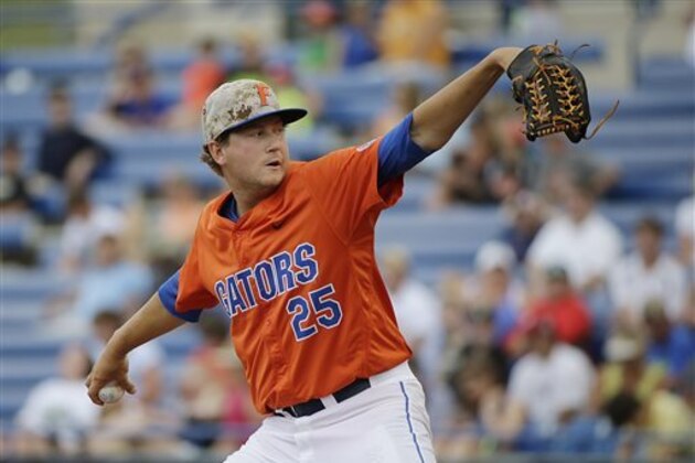 Florida pitcher Eric Hanhold delivers against Vanderbilt during the first inning of a Southeastern Conference NCAA college baseball tournament championship game Sunday, May 24, 2015, in Hoover, Ala. (AP Photo/Brynn Anderson)