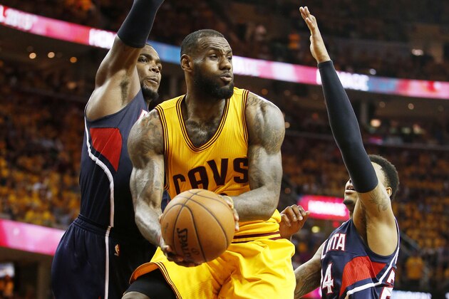 CLEVELAND, OH - MAY 24:  LeBron James #23 of the Cleveland Cavaliers looks to pass against the Atlanta Hawks in the fourth quarter during Game Three of the Eastern Conference Finals of the 2015 NBA Playoffs at Quicken Loans Arena on May 24, 2015 in Cleveland, Ohio. NOTE TO USER: User expressly acknowledges and agrees that, by downloading and or using this Photograph, user is consenting to the terms and conditions of the Getty Images License Agreement.  (Photo by Gregory Shamus/Getty Images)