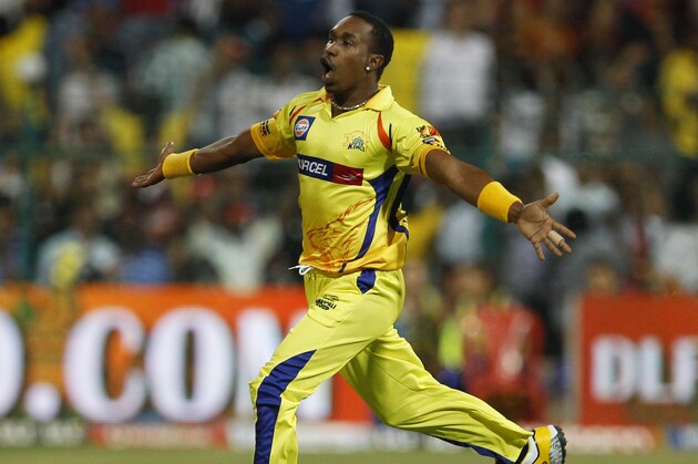 Chennai Super Kings' bowler Dwayne Bravo celebrates the dismissal of Mumbai Indians' batsman James Franklin, not seen, during their Indian Premier League (IPL) playoff cricket match in Bangalore, India, Wednesday, May 23, 2012.  (AP Photo/Aijaz Rahi)