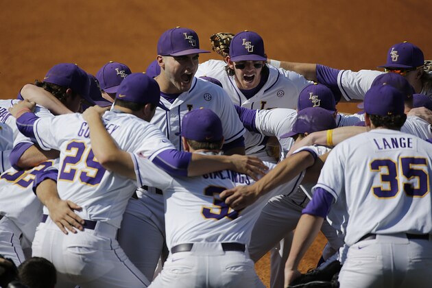 LSU huddles before their game against Florida during a Southeastern Conference college baseball tournament game at the Hoover Met, Saturday, May 23, 2015, in Hoover, Ala. (AP Photo/Brynn Anderson)