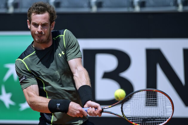 Andy Murray, of Britain, returns the ball to Jeremy Chardy, of France, during their match at the Italian Open tennis tournament, in Rome, Wednesday, May 13, 2015. (AP Photo/Andrew Medichini)