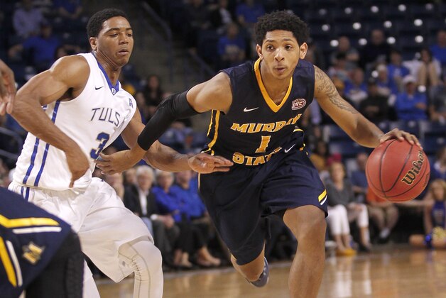 Murray State's Cameron Payne drives around Tulsa's Shaquille Harrison during the second half of an NCAA college basketball game in the National Invitation Tournament, Monday, March 23, 2015, in Tulsa, Okla. Murray State beat Tulsa 83-62. (AP Photo/Dave Crenshaw)