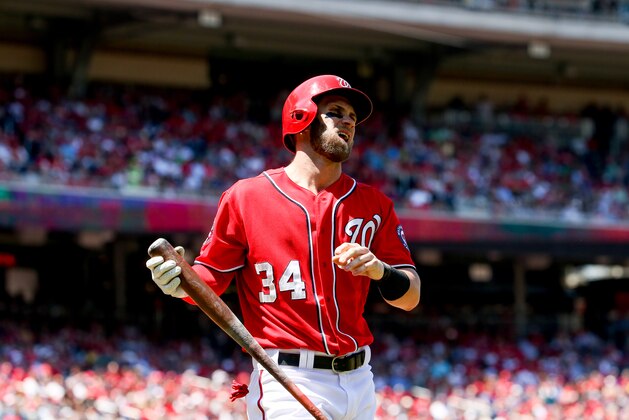 Washington Nationals Bryce Harper reacts to a pitch in the third inning during a baseball game against the Philadelphia Phillies, Sunday, May 24, 2015, at Nationals Park in Washington. (AP Photo/Andrew Harnik)