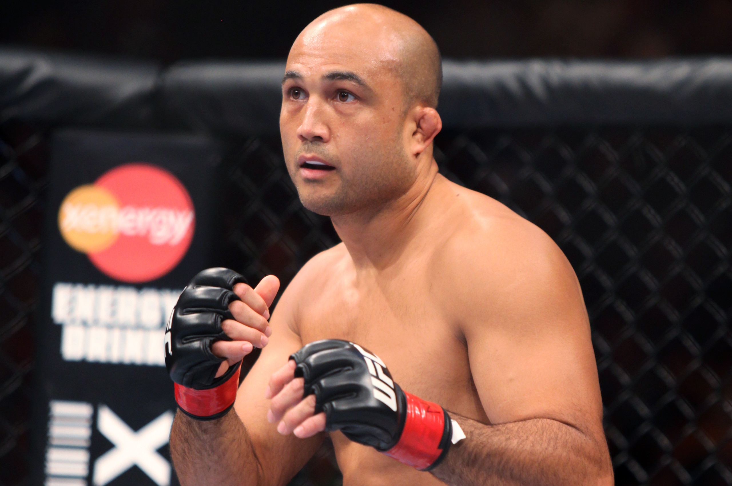 BJ Penn is seen in action against Rory MacDonald during their mixed martial arts bout at a UFC on FOX 5 event in Seattle, Saturday, Dec. 8, 2012. MacDonald won via unanimous decision. (AP Photo/Gregory Payan)