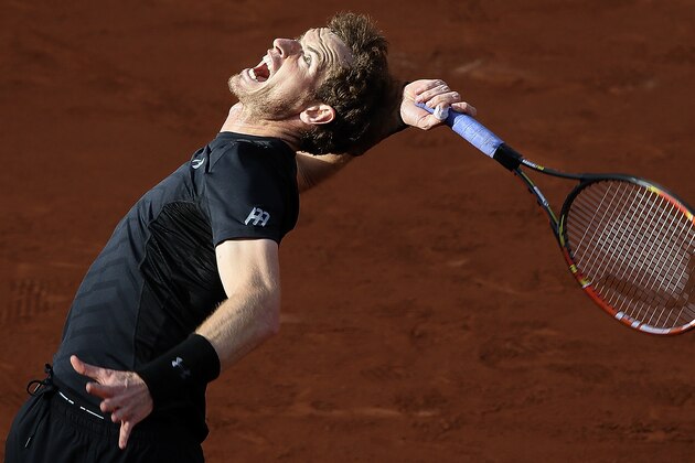Britain's Andy Murray serves the ball to Argentina's Facundo Arguello during their first round match of the French Open tennis tournament at the Roland Garros stadium, Monday, May 25, 2015 in Paris. Murray won 6-3, 6-3, 6-1. (AP Photo/David Vincent)