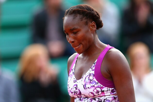 PARIS, FRANCE - MAY 25:  A dejected Venus Williams of the United States during  her Women's Singles match against Sloane Stephens of the United States on day two of the 2015 French Open at Roland Garros on May 25, 2015 in Paris, France.  (Photo by Clive Brunskill/Getty Images)