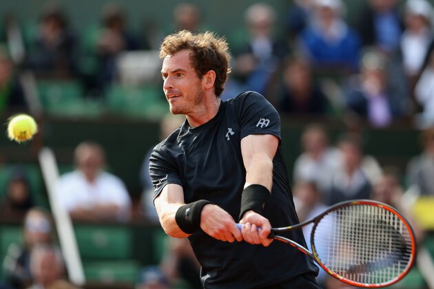 PARIS, FRANCE - MAY 25:  Andy Murray of Great Britain plays a backhand in his Men's Singles match against  Facundo Arguello of Argentina on day two of the 2015 French Open at Roland Garros on May 25, 2015 in Paris, France.  (Photo by Clive Mason/Getty Images)